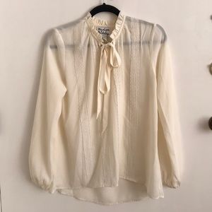 Tie neck blouse with ruffle collar